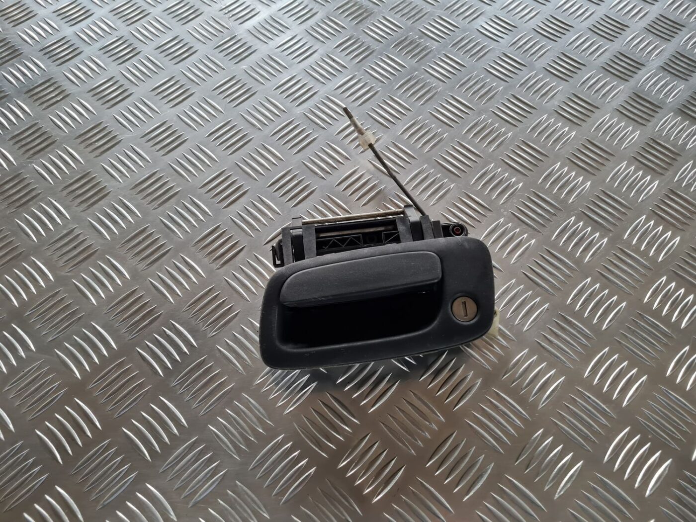 Priekšējāis kreisais durvju rokturis priekš OPEL ZAFIRA 1999