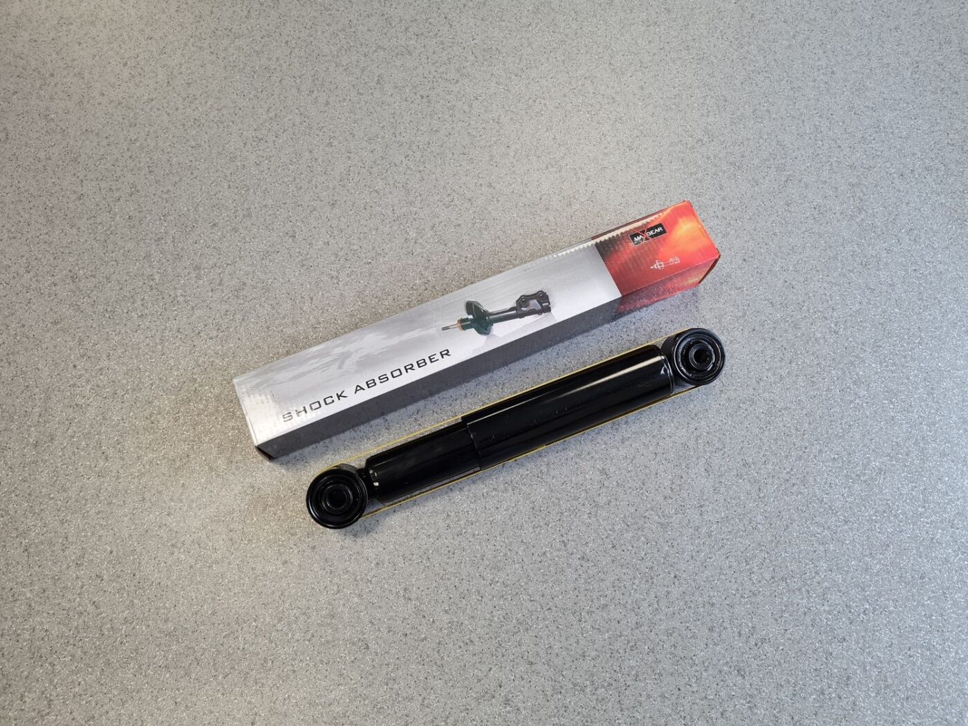 Aizmugurējais amortizators priekš